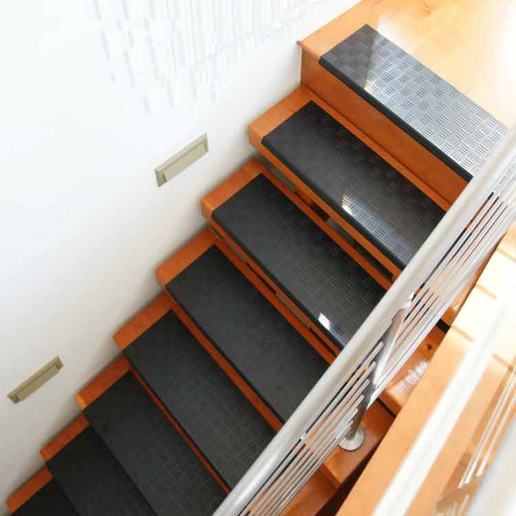 Basement rubber stair with vinyl stair treads